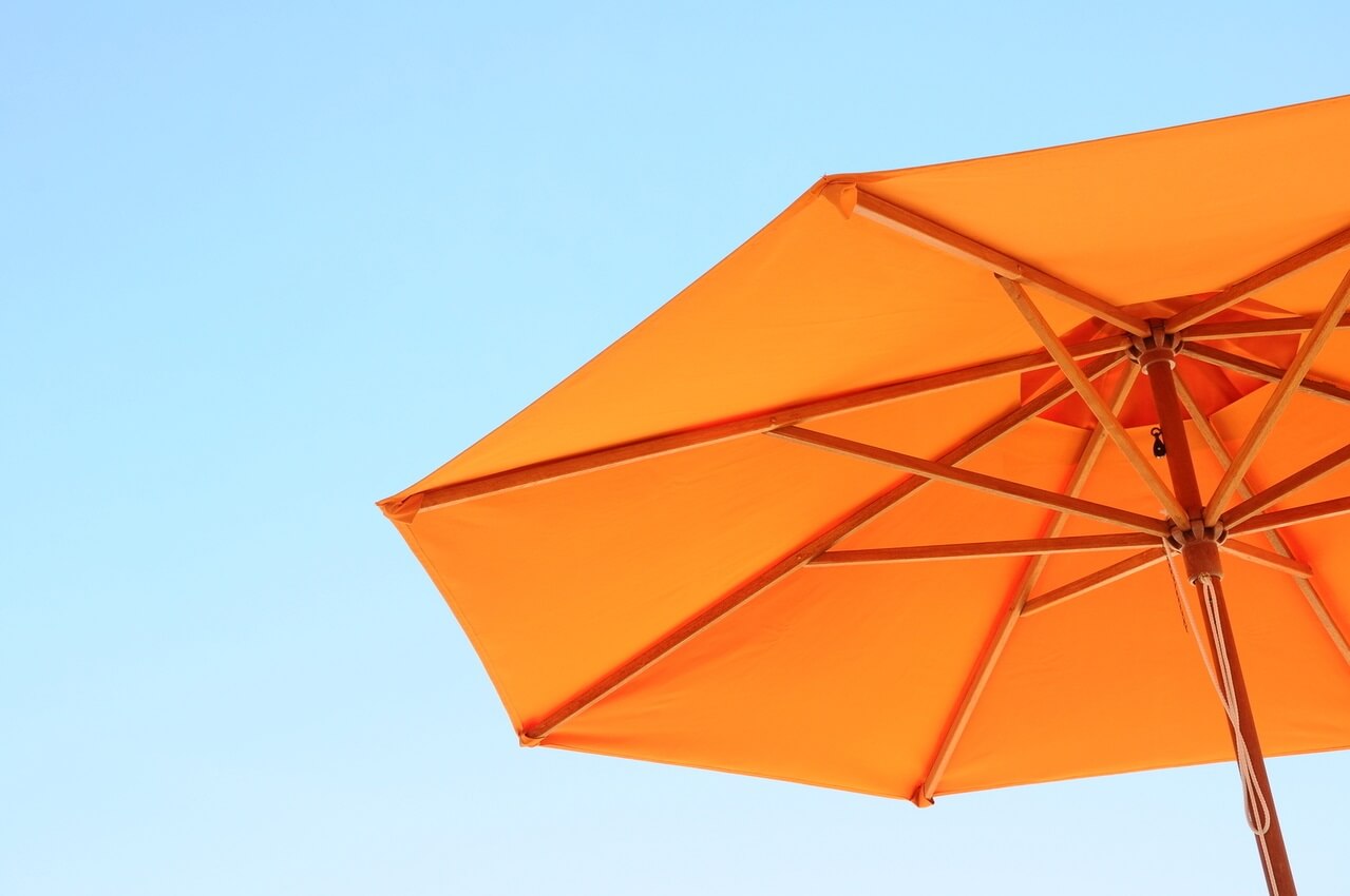 Orange-beach-umbrella-2-freeimagex-1246136